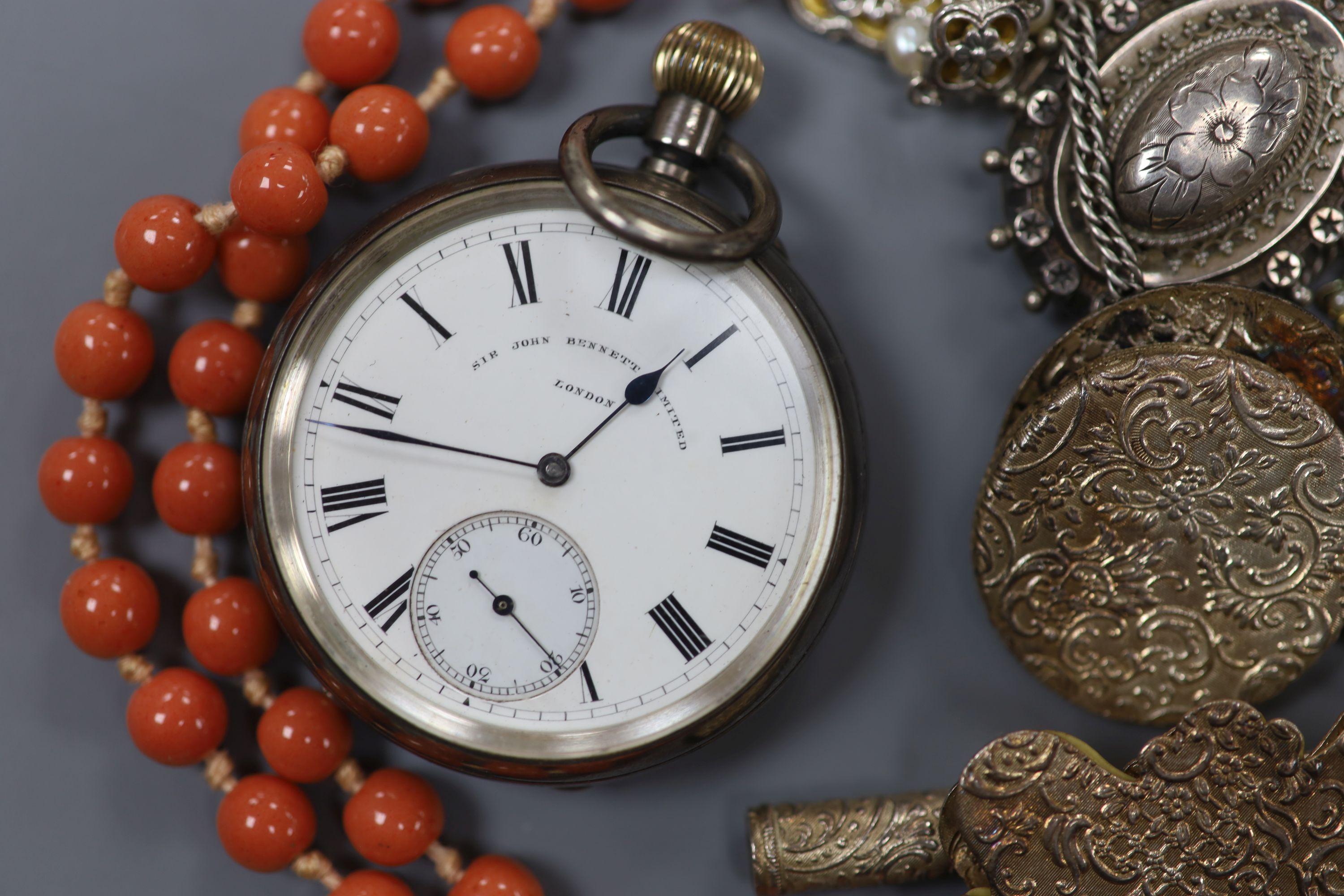 A late Victorian silver open face keyless pocket watch, by Sir John Bennett Ltd and a small quantity of mixed jewellery, including a Victorian silver locket, Scottish hardstone set cufflinks and a continental white metal